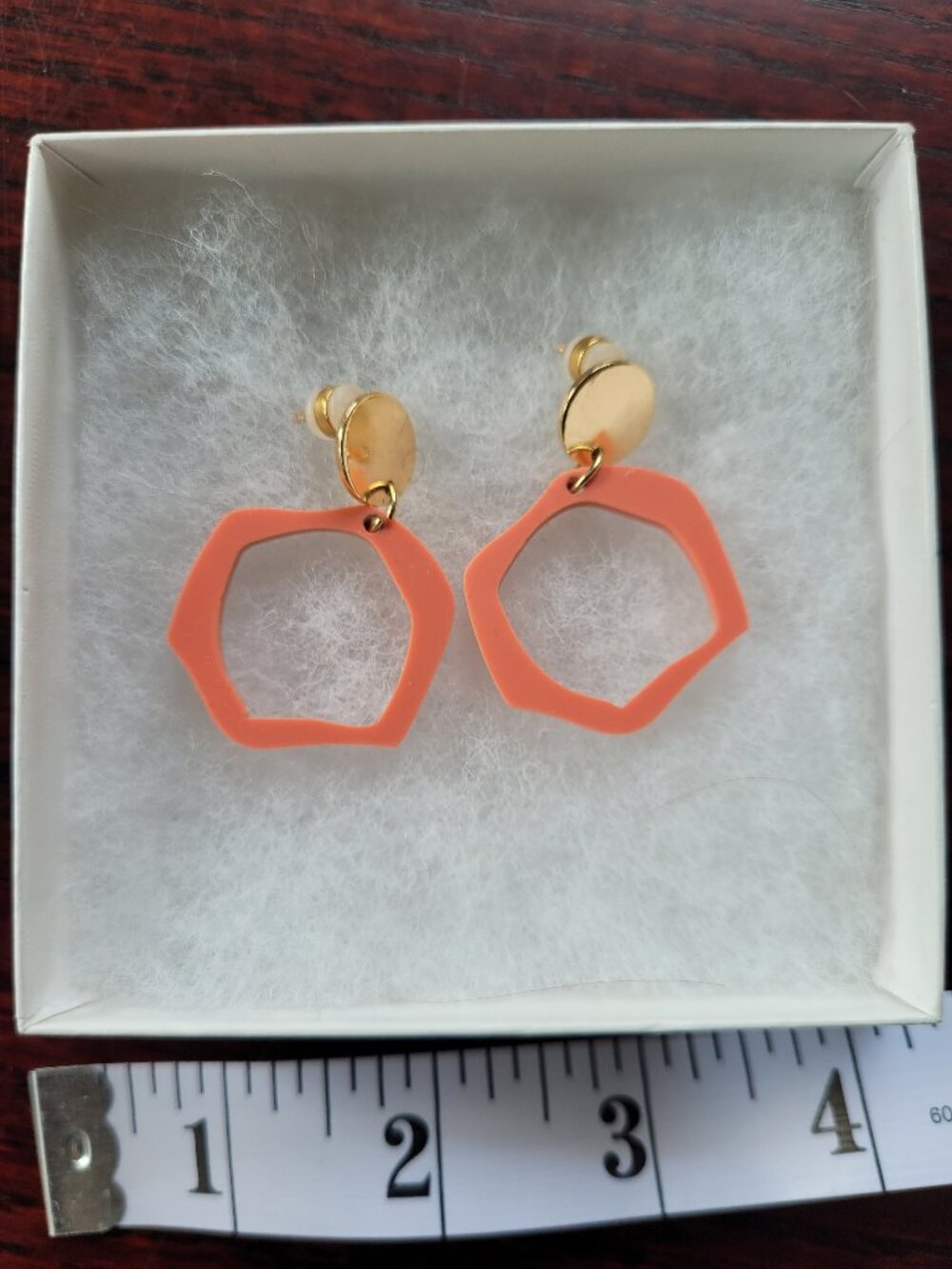 Pretty in pink/salmon color earrings with gold color studs